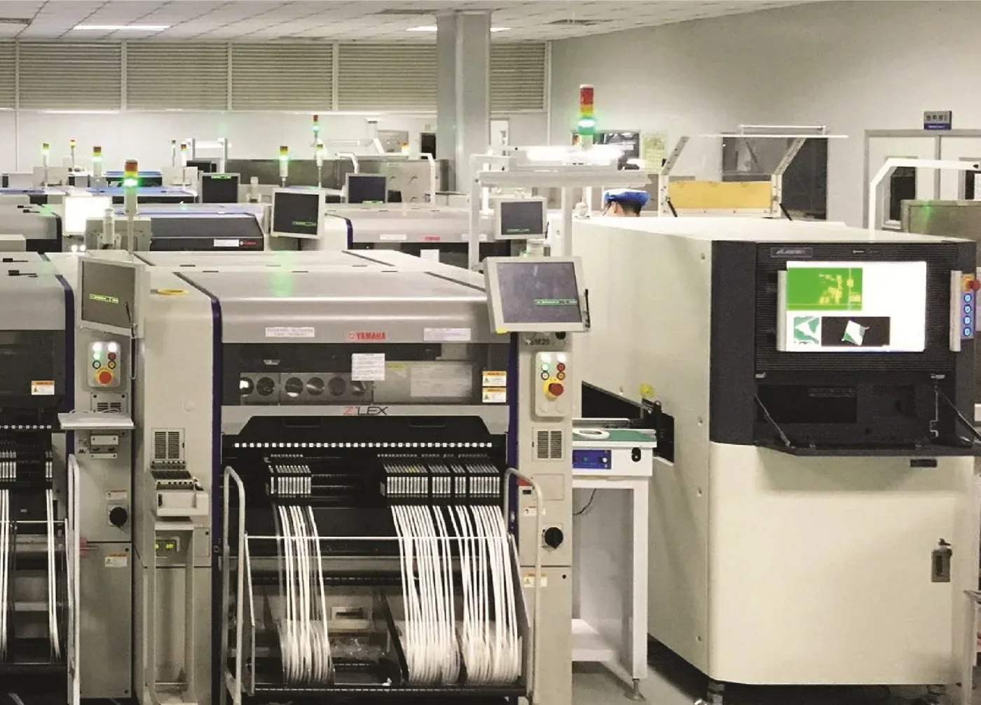 A surface-mount technology (SMT) line with automated optical inspection
