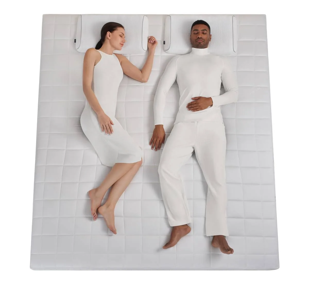 Two people in two different sleeping positions on the same AI mattress