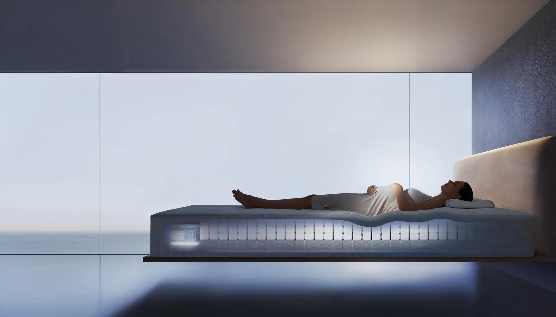 A person resting on the HEKA AI Mattress in a quiet night-time room, the system inside the mattress glowing softly